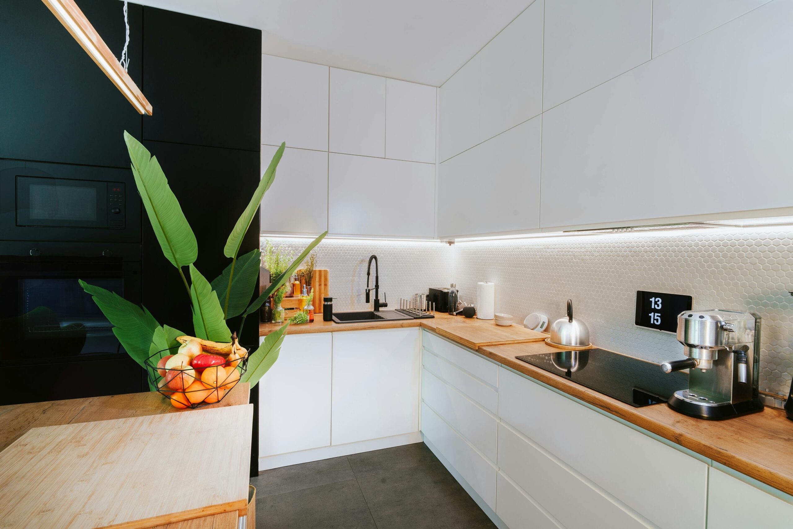 A sleek smart coffee maker on a kitchen counter