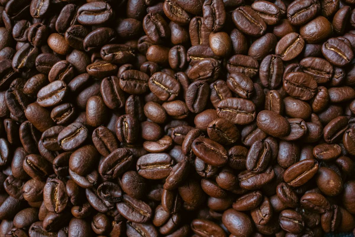 A modern smart coffee machine brewing a fresh cup of coffee