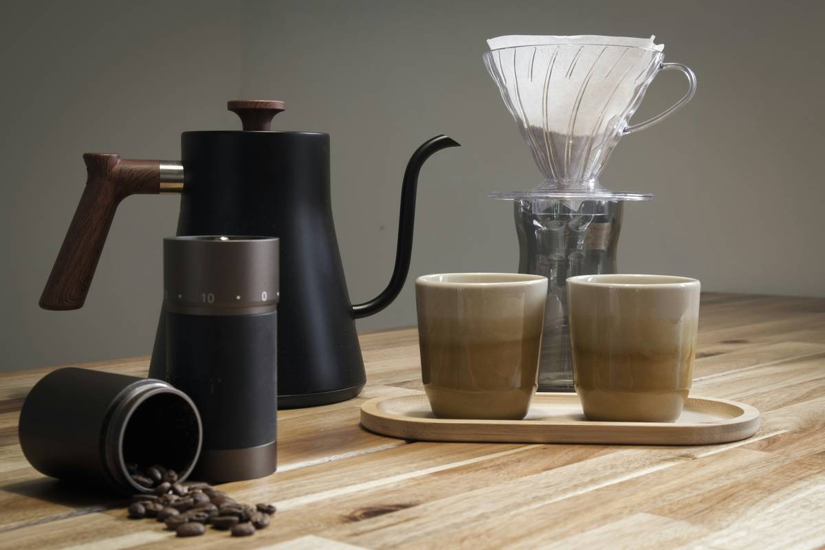 A modern smart coffee maker sitting on a kitchen counter