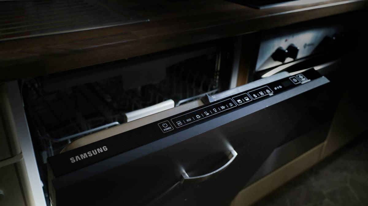 A sleek smart coffee maker on a kitchen counter