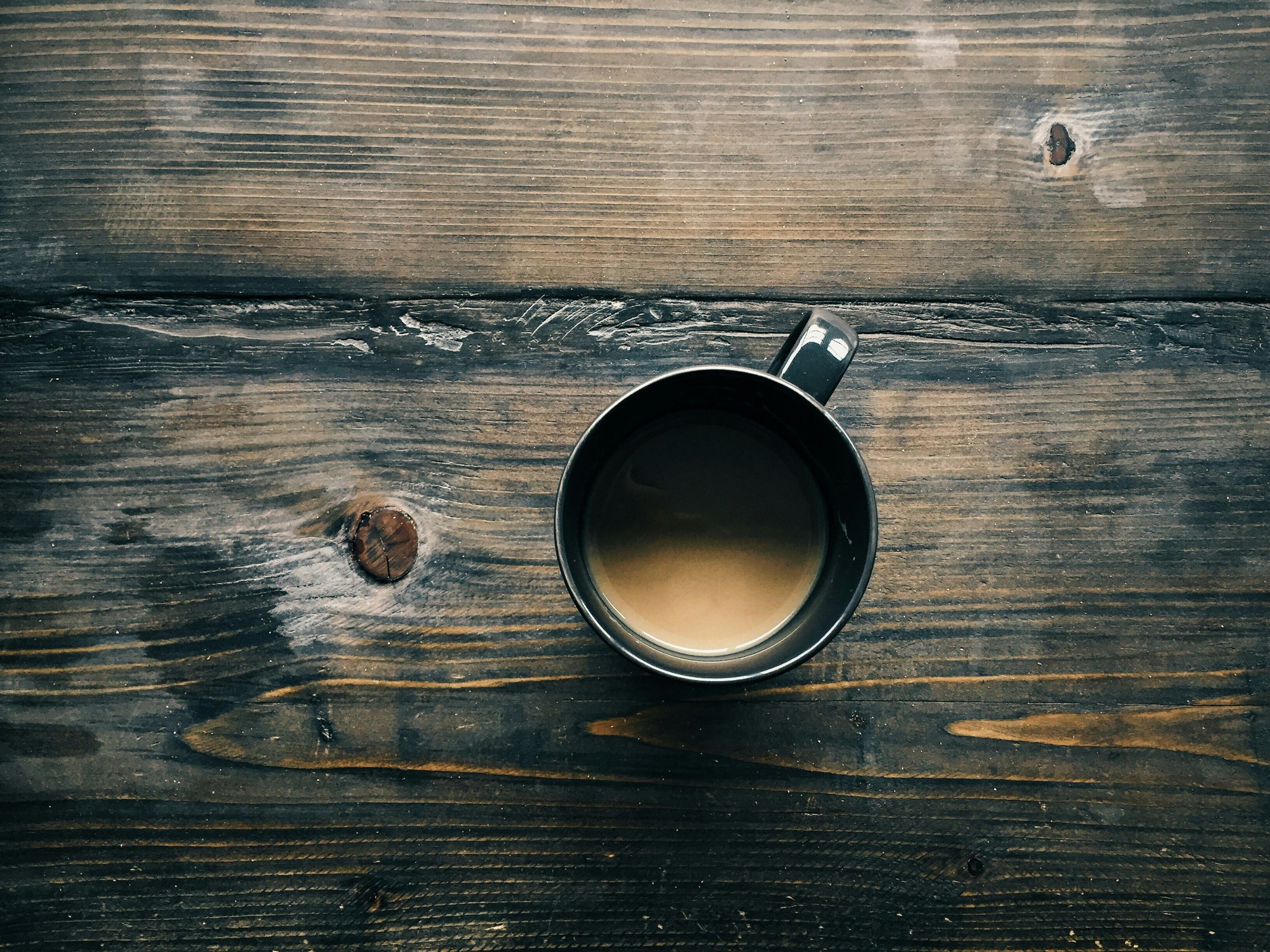 Screenshot showing settings menu on a smart coffee maker with options for brew strength.