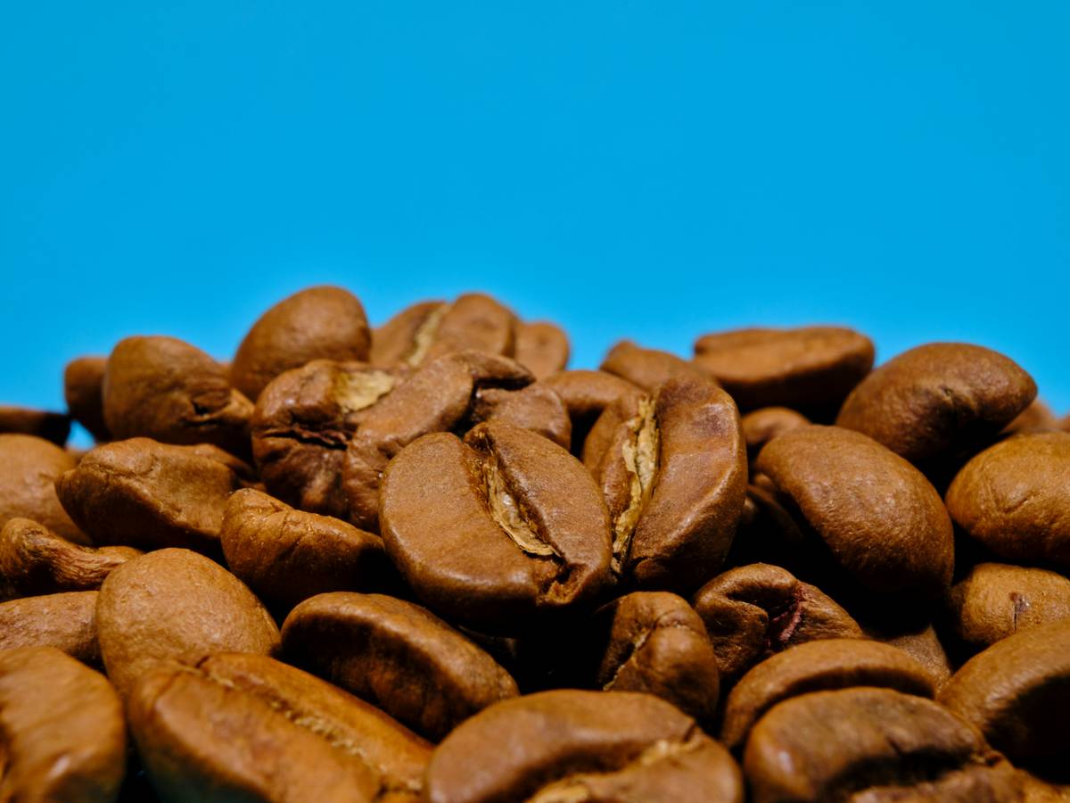 Fresh roasted coffee beans on a wooden table